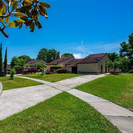 Buy this 3 bed townhouse on 624 Golden Sunshine Circle in Orange County, FL 32807