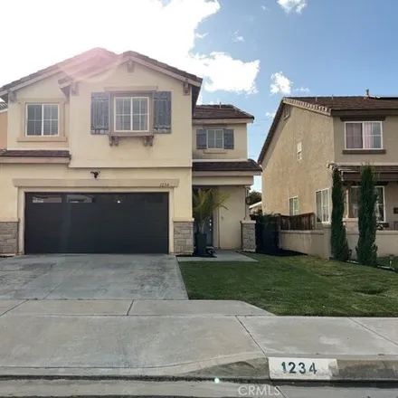 Rent this 4 bed house on 1258 Dolphin Drive in Perris, CA 92571