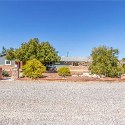 Buy this 4 bed house on 5057 North Tioga Way in Las Vegas, NV 89149