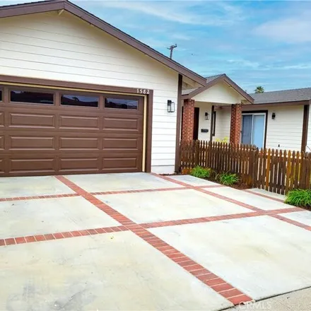 Rent this 4 bed house on 1582 Elm Avenue in Costa Mesa, CA 92626