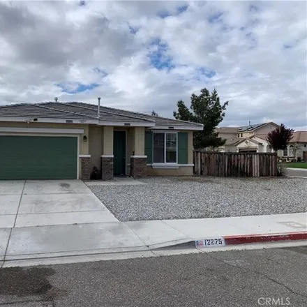 Rent this 4 bed house on 13263 Dixon Street in Victorville, CA 92392