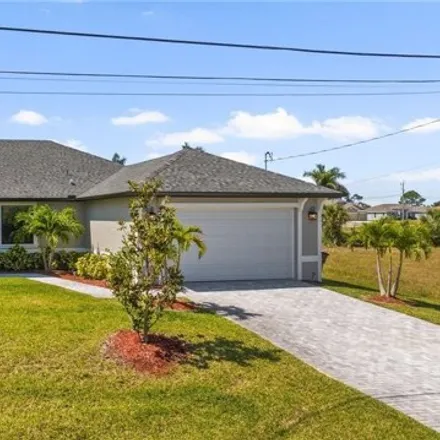 Buy this 4 bed house on 3225 Northwest 18th Street in Cape Coral, FL 33993