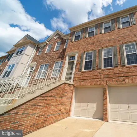 Rent this 4 bed townhouse on 6138 Manchester Park Circle in Alexandria, VA 22310