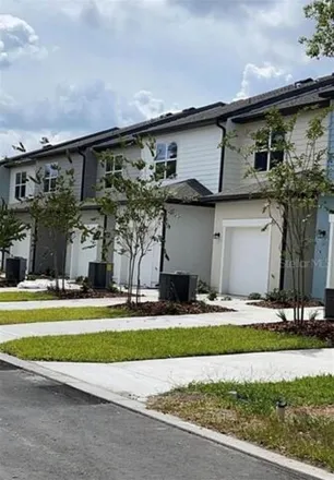Rent this 3 bed townhouse on 3530 Eunice Avenue in Orange County, FL 32808