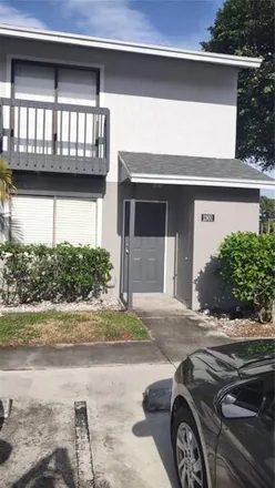 Rent this 3 bed townhouse on 1135 Seaside Drive in Greenacres, FL 33463