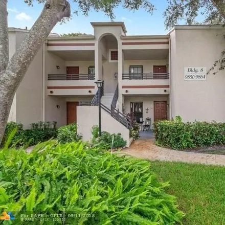 Rent this 2 bed condo on 9854 Northwest 3rd Court