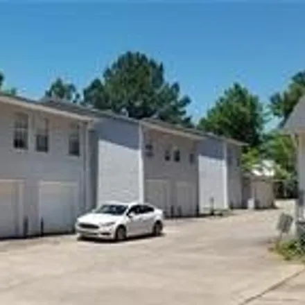 Rent this 3 bed townhouse on 611 West Adams Street in Fayetteville, AR 72701