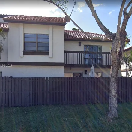Buy this 2 bed townhouse on 11105 Southwest 132nd Court in Miami-Dade County, FL 33186