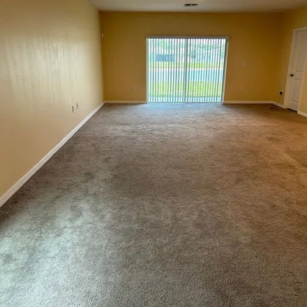 Rent this 4 bed apartment on 4546 Big Island Drive in Osceola County, FL 34746