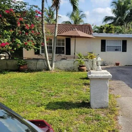 Buy this 4 bed house on 5559 Northwest 76th Place in Broward County, FL 33073