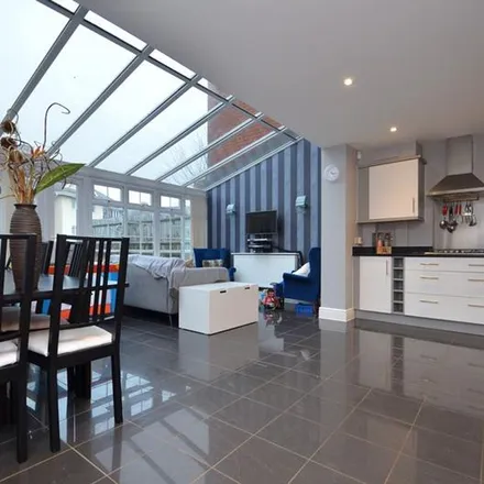 Rent this 4 bed townhouse on Flowerdown Court in Flowers Avenue, London
