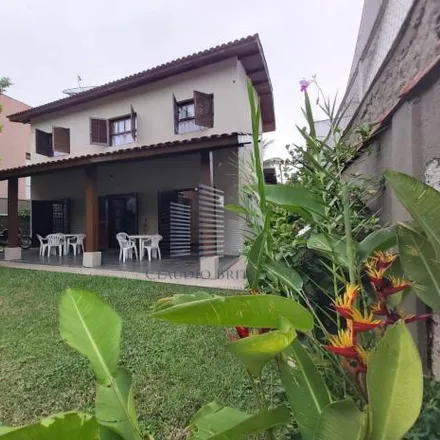 Buy this 6 bed house on Passeio das Garaunas in São Lourenço, Bertioga - SP