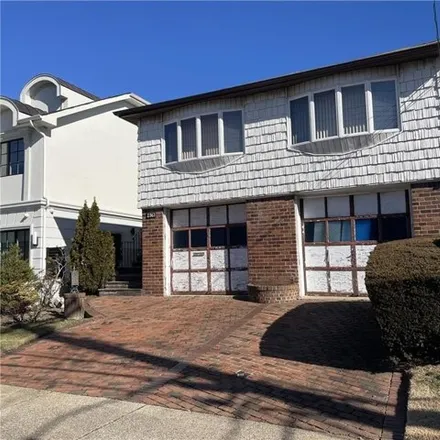 Buy this 4 bed house on 2363 56th Drive in New York, NY 11234