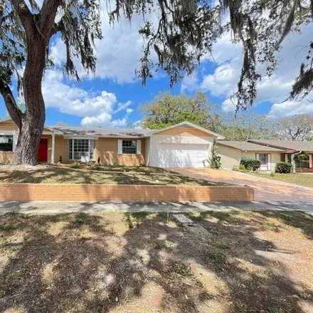 Buy this 4 bed house on 5607 Hollow Oak Road in Orange County, FL 32808