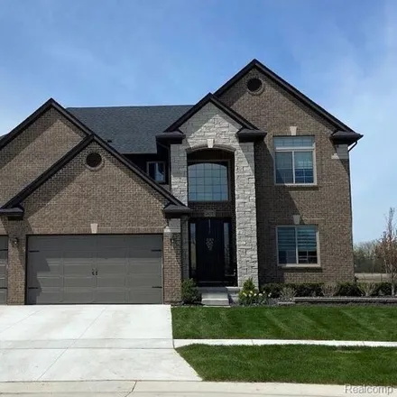 Buy this 4 bed house on Springbrook Drive in Macomb Township, MI 48044