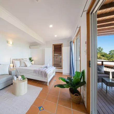 Rent this 4 bed house on Airlie Beach in Whitsunday Regional, Queensland