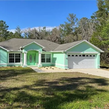Buy this 4 bed house on 38 Mimosa Court East in Citrus County, FL 34446