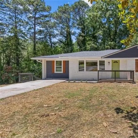 Buy this 4 bed house on 6047 Walker Rd in Riverdale, Georgia