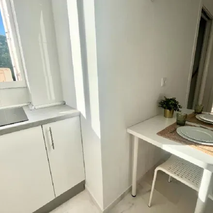 Rent this 4 bed apartment on Avenida Sánchez Pizjuán in 41071 Seville, Spain