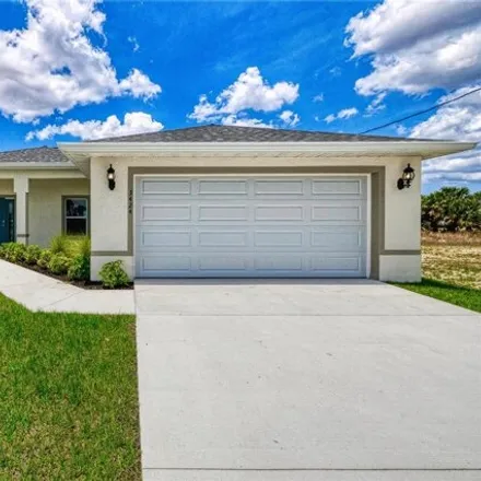 Buy this 4 bed house on 3428 Northeast 15th Avenue in Cape Coral, FL 33909