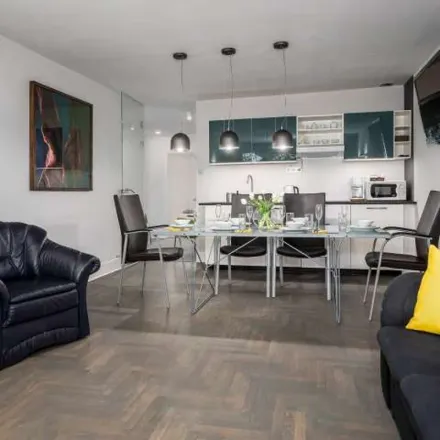 Rent this 3 bed apartment on Lipowa in 00-311 Warsaw, Poland