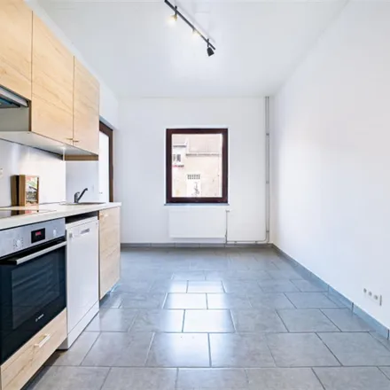 Rent this 4 bed apartment on Impasse Quinet in 7000 Mons, Belgium