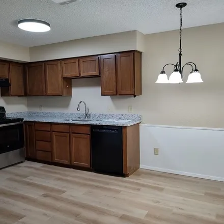 Rent this 2 bed apartment on 904 Meadowbrook Drive in Grapevine, TX 76051