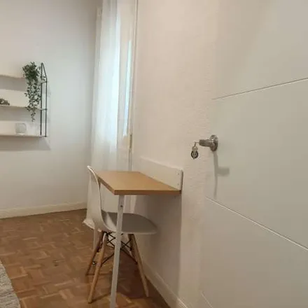 Rent this 7 bed apartment on Calle Príncipe de Asturias in 4, 28006 Madrid