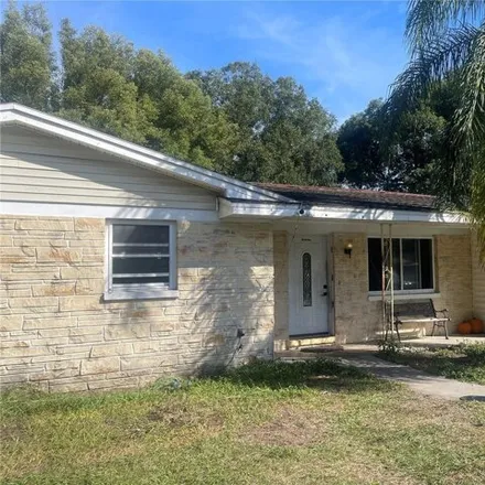 Buy this 4 bed house on 5190 Suburban Drive in Hillsborough County, FL 33566