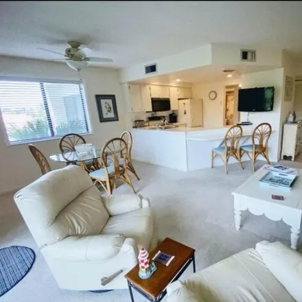 Rent this 2 bed condo on 1605 S Us Highway 1 Apt E306 in Jupiter, Florida