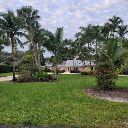 Rent this 5 bed house on 49 Milestone Way in West Palm Beach Farms, Palm Beach County