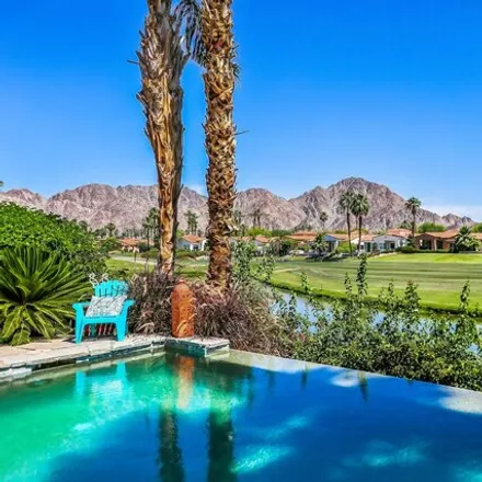 Rent this 3 bed house on 50328 Valencia Court in La Quinta, CA 92253