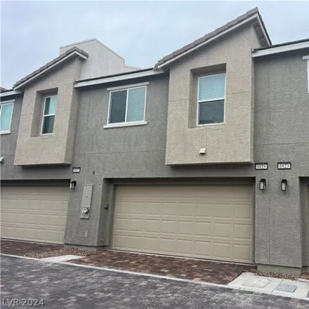 Rent this 3 bed townhouse on Torch Red Court in North Las Vegas, NV 89086