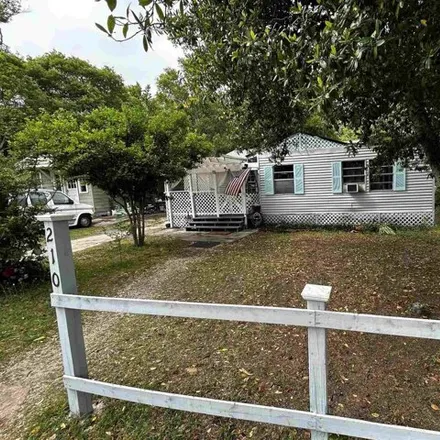 Buy this 4 bed house on 262 Frisco Road in Escambia County, FL 32507