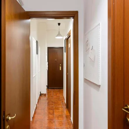 Rent this 4 bed room on Via Francesco Cavezzali in 19, 20127 Milan MI