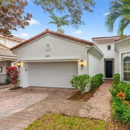 Buy this 2 bed house on 1071 Vintner Boulevard in Palm Beach Gardens, FL 33410