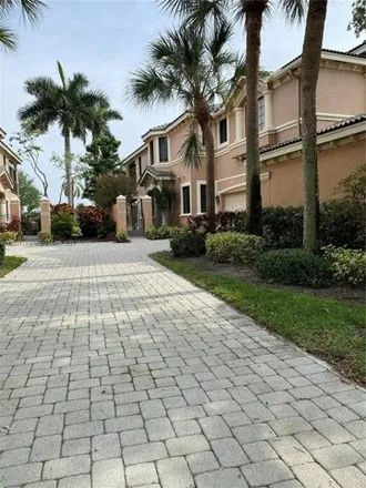 Rent this 3 bed condo on 2744 Center Court Drive in Weston, FL 33332