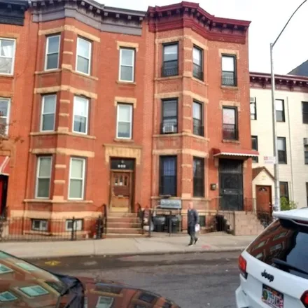 Buy this 8 bed townhouse on 331 56th Street in New York, NY 11220