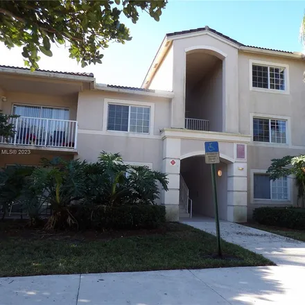 Rent this 2 bed apartment on 5098 Hilton Road in Coconut Creek, FL 33073