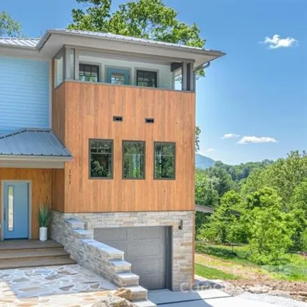 Buy this 4 bed house on 13 Stonebridge Drive in Haw Creek, Asheville