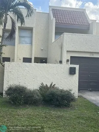 Buy this 3 bed townhouse on 1700 Northwest 57th Terrace in Lauderhill, FL 33313