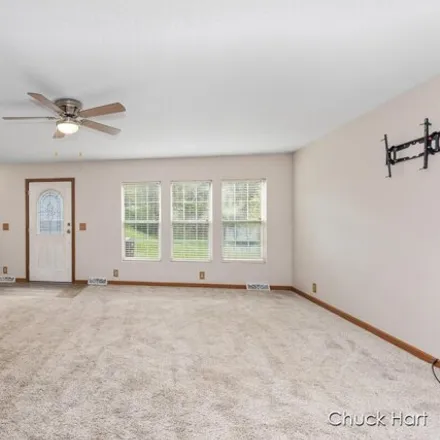 Image 6 - 16221 Wildwood Valley Drive, Solon Township, MI 49319, USA - House for sale