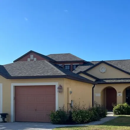 Rent this 2 bed house on 1075 Luminary Cir Unit 105 in Melbourne, Florida