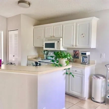Rent this 1 bed condo on 9418 Summerbreeze Drive in Sunrise, FL 33322