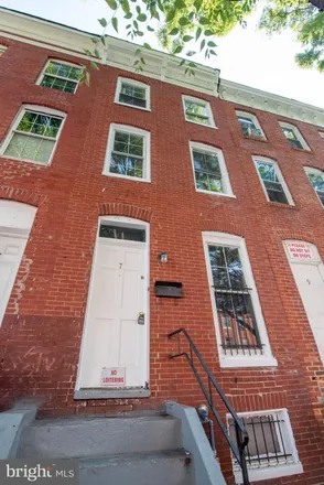 Buy this 4 bed townhouse on 7 South Carey Street in Baltimore, MD 21223
