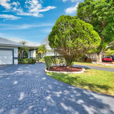 Buy this 5 bed house on 12499 Classic Drive in Coral Springs, FL 33071