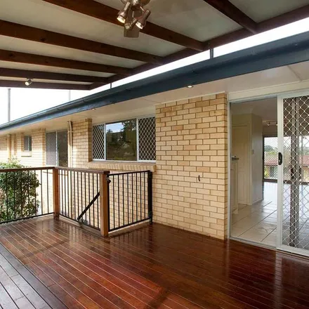 Rent this 4 bed apartment on 27 Menkira Street in Mansfield QLD 4122, Australia