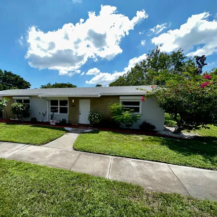 Buy this 3 bed house on 2621 Southwest Natura Avenue in Arlington Park, Deerfield Beach