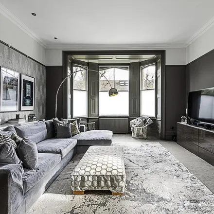 Rent this 4 bed duplex on Laveham Court in 21 Upper Richmond Road, London