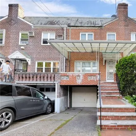 Buy this 3 bed house on 66-16 Clyde Street in New York, NY 11374